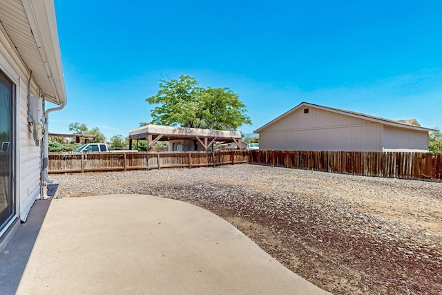 508 San Juan De Rio Dr SE, Rio Rancho, NM 87124 - fenced backyard with a patio area