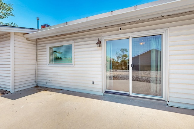 508 San Juan De Rio Dr SE, Rio Rancho, NM 87124 - property entrance with a patio