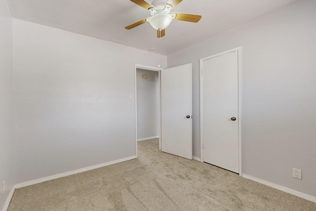 9913 Leyendecker Rd NE, Albuquerque, NM 87112 - unfurnished bedroom with carpet flooring, baseboards, and ceiling fan