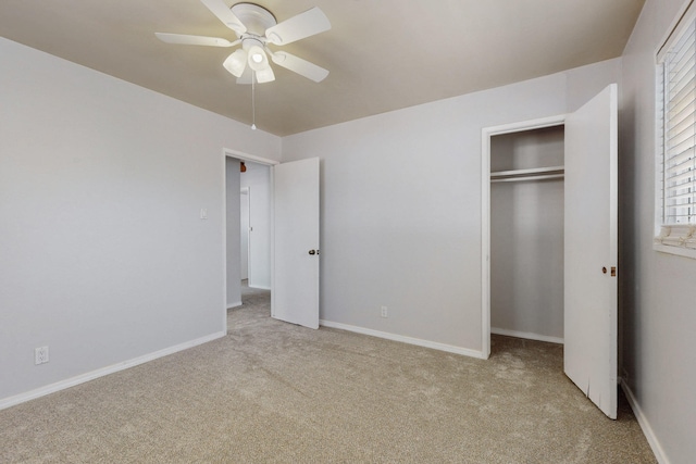 9913 Leyendecker Rd NE, Albuquerque, NM 87112 - unfurnished bedroom with carpet, a closet, multiple windows, and baseboards