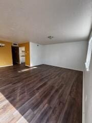 1100 10th St SW, Albuquerque, NM 87102 - unfurnished living room with wood finished floors