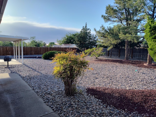 4111 El Cajon Ct SE, Rio Rancho, NM 87124 - fenced backyard featuring a patio area