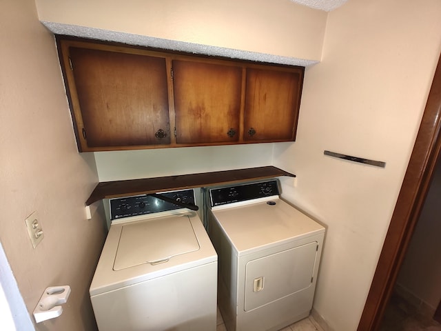 4111 El Cajon Ct SE, Rio Rancho, NM 87124 - laundry area with washer and clothes dryer and cabinet space