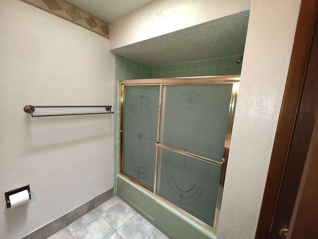 4111 El Cajon Ct SE, Rio Rancho, NM 87124 - full bathroom with shower / bath combination with glass door and tile patterned floors