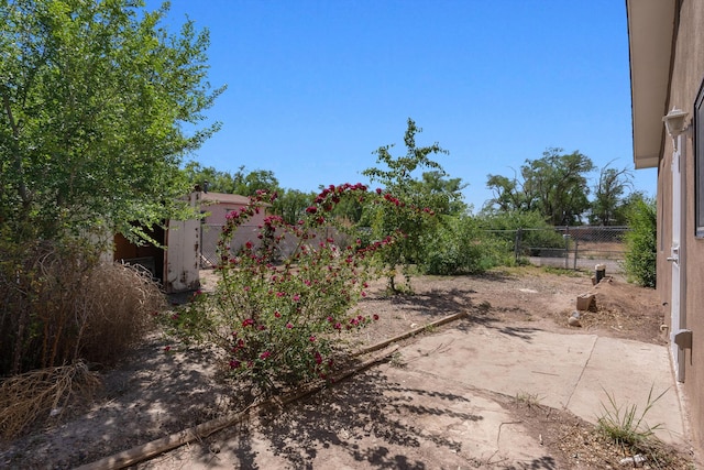 2012 Foothill Dr SW, Albuquerque, NM 87105 - fenced backyard with a patio