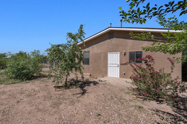2012 Foothill Dr SW, Albuquerque, NM 87105 - back of house featuring stucco siding