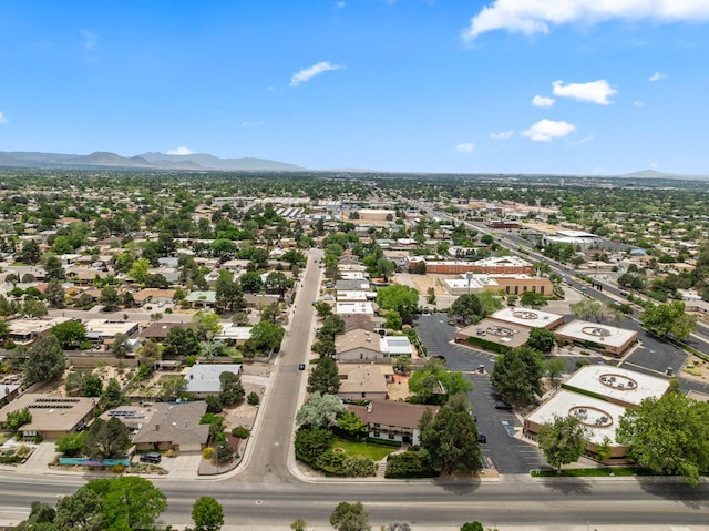 8480 Osuna Rd NE, Albuquerque, NM 87111 - aerial perspective of suburban area featuring a mountain backdrop