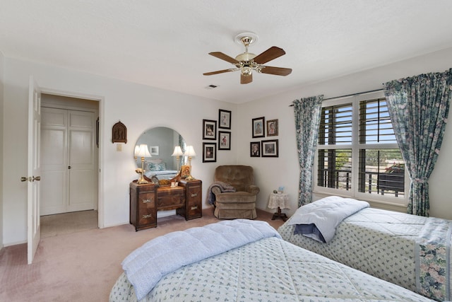 8480 Osuna Rd NE, Albuquerque, NM 87111 - bedroom with carpet floors, ceiling fan, and baseboards