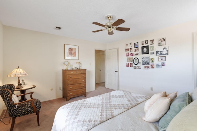 8480 Osuna Rd NE, Albuquerque, NM 87111 - bedroom featuring light colored carpet, ceiling fan, and baseboards
