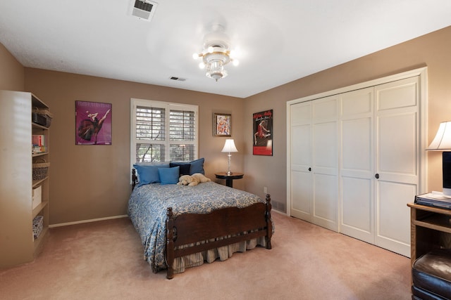 8480 Osuna Rd NE, Albuquerque, NM 87111 - bedroom featuring baseboards, light colored carpet, and a closet