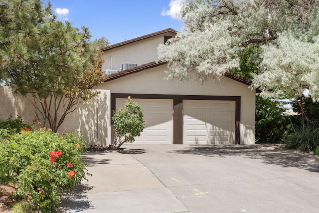 8480 Osuna Rd NE, Albuquerque, NM 87111 - garage featuring driveway