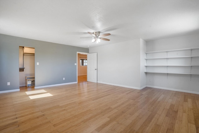 4509 Tottle Ave NW, Albuquerque, NM 87114 - unfurnished room with a ceiling fan, light wood-type flooring, and baseboards