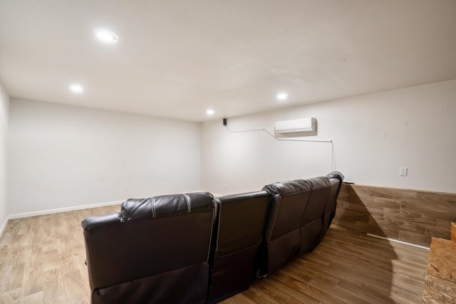 4509 Tottle Ave NW, Albuquerque, NM 87114 - home theater room featuring a wall mounted air conditioner, wood finished floors, and recessed lighting