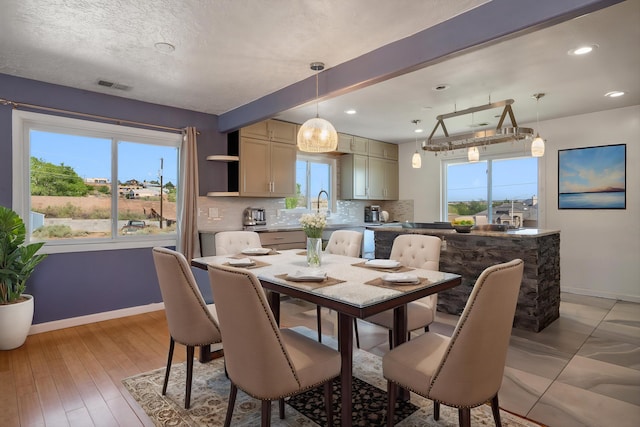 4509 Tottle Ave NW, Albuquerque, NM 87114 - dining room featuring baseboards and recessed lighting