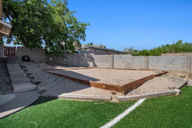 4509 Tottle Ave NW, Albuquerque, NM 87114 - fenced backyard with a bocce ball area