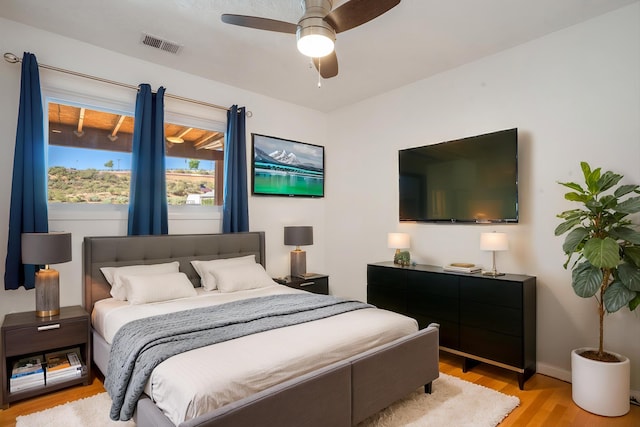 4509 Tottle Ave NW, Albuquerque, NM 87114 - bedroom featuring light wood-style flooring, baseboards, and ceiling fan