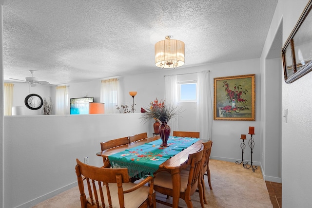 1951 Corta Rustica, Los Lunas, NM 87031 - dining room with a textured ceiling, carpet flooring, a chandelier, and a ceiling fan