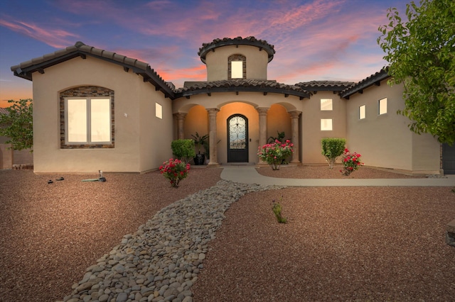 405 Holt Ct NE, Rio Rancho, NM 87124 - mediterranean / spanish-style house with stucco siding and a tile roof
