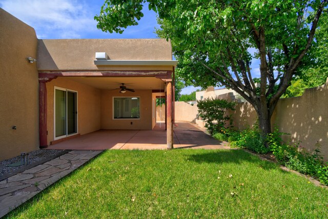 2705 Pueblo Grande Trl NW, Albuquerque, NM 87120 - view of yard featuring ceiling fan and a patio area