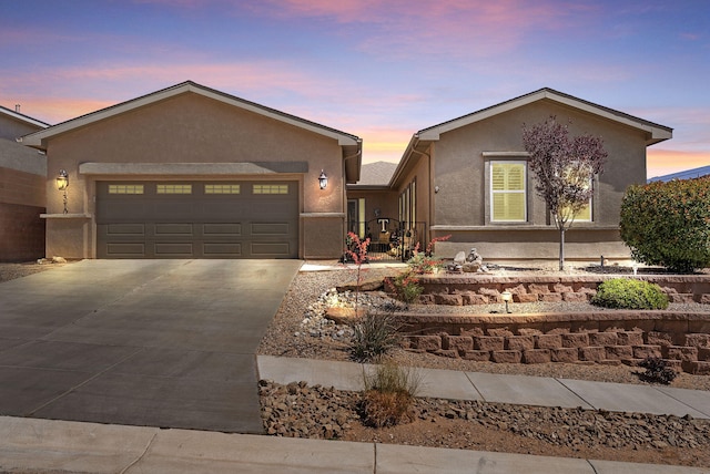 4210 Agave Ct SW, Los Lunas, NM 87031 - ranch-style home featuring stucco siding, driveway, and an attached garage