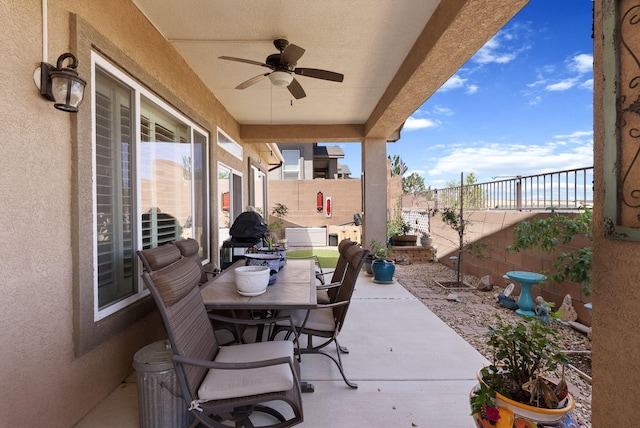 4210 Agave Ct SW, Los Lunas, NM 87031 - fenced backyard featuring a ceiling fan, a patio, and outdoor dining area