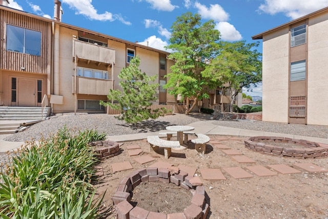 3867 Montgomery Blvd NE Unit 1633, Albuquerque, NM 87109 - view of home's community with a fire pit and a patio