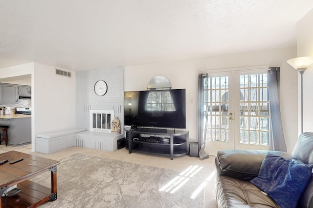 648 Frederico Blvd, Rio Communities, NM 87002 - living area with french doors and light colored carpet