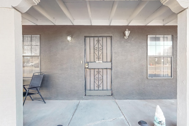 648 Frederico Blvd, Rio Communities, NM 87002 - doorway to property featuring stucco siding