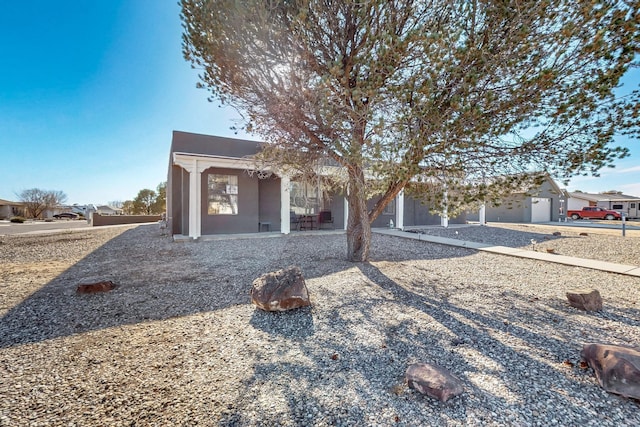648 Frederico Blvd, Rio Communities, NM 87002 - view of property hidden behind natural elements with stucco siding