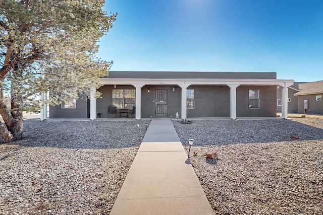 648 Frederico Blvd, Rio Communities, NM 87002 - ranch-style house with covered porch and stucco siding