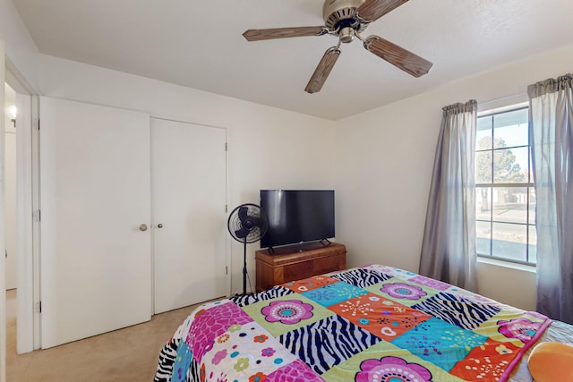 648 Frederico Blvd, Rio Communities, NM 87002 - bedroom featuring light carpet, a closet, and a ceiling fan