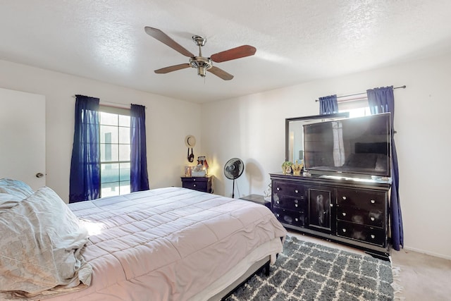 648 Frederico Blvd, Rio Communities, NM 87002 - carpeted bedroom featuring a ceiling fan, a textured ceiling, and baseboards