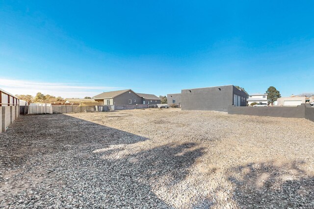 648 Frederico Blvd, Rio Communities, NM 87002 - fenced backyard with a residential view