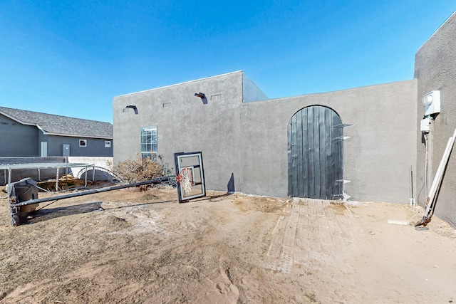 648 Frederico Blvd, Rio Communities, NM 87002 - view of side of home featuring stucco siding