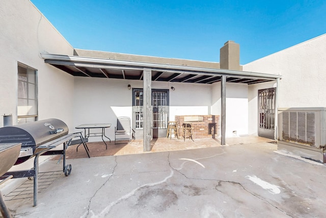 648 Frederico Blvd, Rio Communities, NM 87002 - view of patio / terrace with central AC unit and grilling area