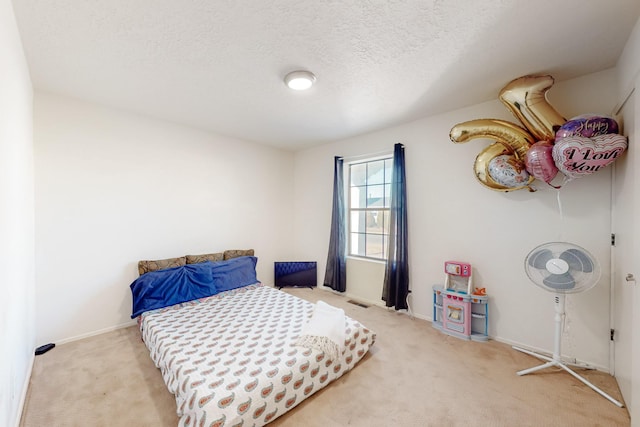 648 Frederico Blvd, Rio Communities, NM 87002 - carpeted bedroom with a textured ceiling and baseboards