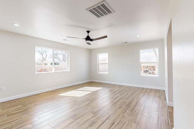 5600 Greer Loop SW, Albuquerque, NM 87105 - empty room featuring light wood finished floors, ceiling fan, and recessed lighting