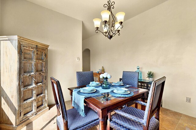 1 Seasons Cir, Placitas, NM 87043 - dining room with arched walkways and a chandelier