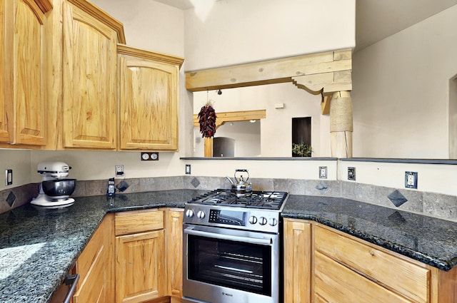 1 Seasons Cir, Placitas, NM 87043 - kitchen with stainless steel range with gas stovetop, light brown cabinetry, and dark stone counters