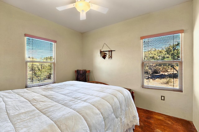 1 Seasons Cir, Placitas, NM 87043 - bedroom featuring multiple windows and a ceiling fan