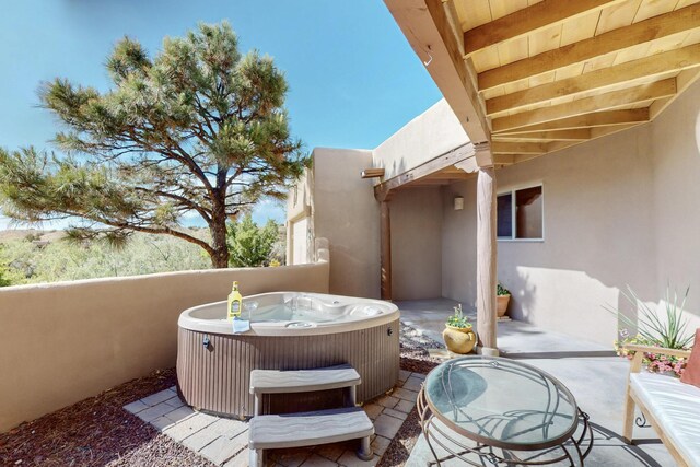 1 Seasons Cir, Placitas, NM 87043 - view of patio / terrace with a hot tub
