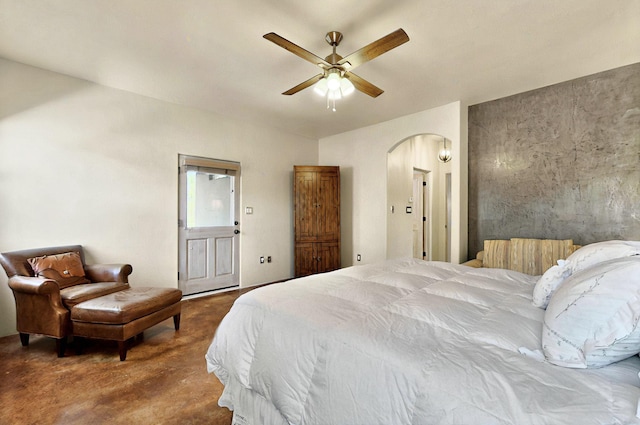 1 Seasons Cir, Placitas, NM 87043 - bedroom with arched walkways, concrete flooring, and ceiling fan