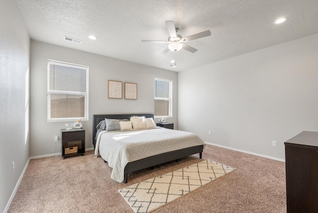 3217 Vatapa Rd NE, Rio Rancho, NM 87144 - bedroom featuring light colored carpet, baseboards, a textured ceiling, recessed lighting, and ceiling fan