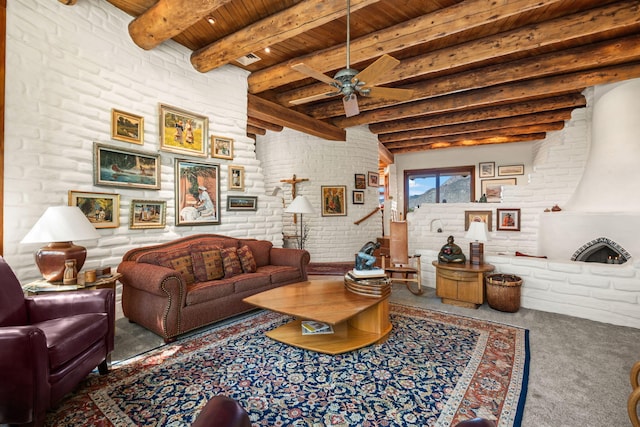 1572 Eagle Ridge Ct NE, Albuquerque, NM 87122 - living room featuring wooden ceiling with exposed beams, brick wall, carpet flooring, and ceiling fan