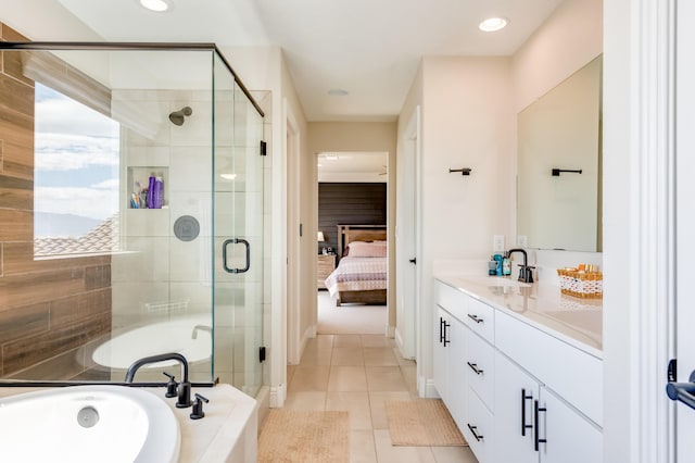 1608 Mammoth Way, Albuquerque, NM 87120 - ensuite bathroom with double vanity, a stall shower, a garden tub, tile patterned flooring, and recessed lighting