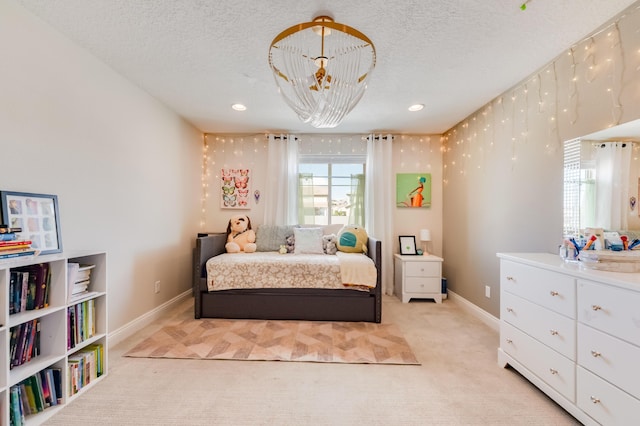 1608 Mammoth Way, Albuquerque, NM 87120 - bedroom with light colored carpet, baseboards, a textured ceiling, a chandelier, and recessed lighting