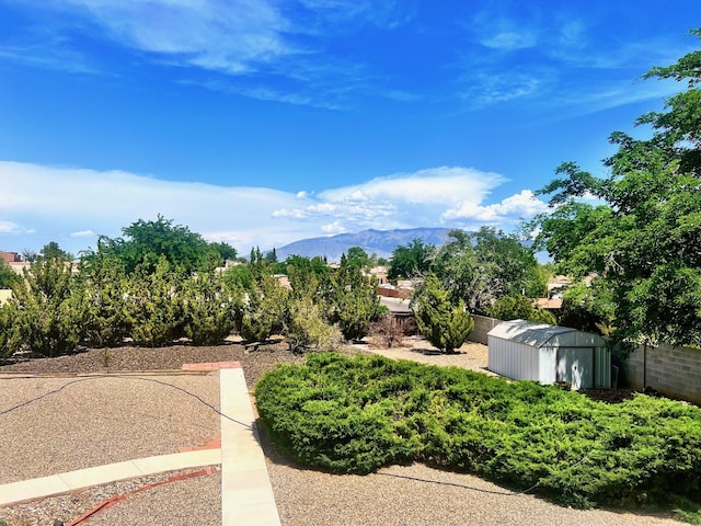 10008 Greene Ave NW, Albuquerque, NM 87114 - view of yard featuring a mountain view