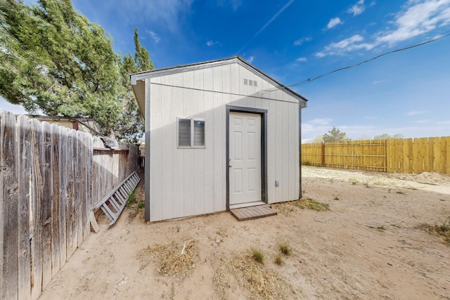 1128 Pandora Dr SW, Los Lunas, NM 87031 - view of shed with a fenced backyard