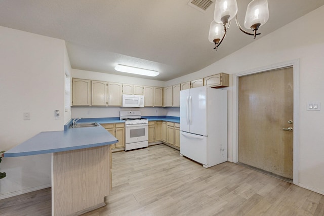 1128 Pandora Dr SW, Los Lunas, NM 87031 - kitchen with white appliances, a peninsula, a sink, light wood-type flooring, and light brown cabinets