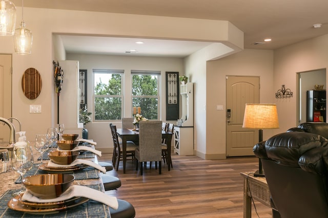 31 Express Blvd, Sandia Park, NM 87047 - dining room with wood finished floors, baseboards, and recessed lighting